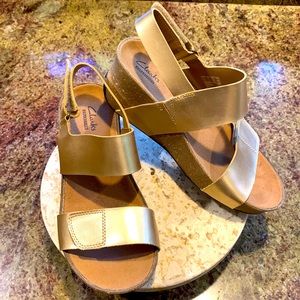 Clarks Women’s Auriel Fin Wedge Sandal, Gold